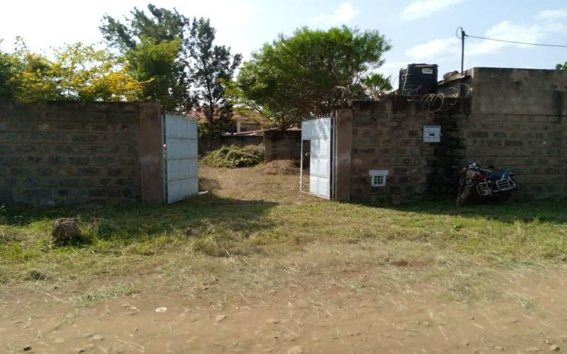 Thika Landless Plot for Sale | Secure 100x100 Land with Servant Quarters & Trees