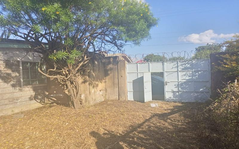 Thika Landless Plot for Sale | Secure 100x100 Land with Servant Quarters & Trees